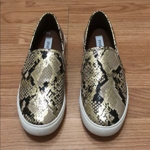 Snakeskin slip on sneakers